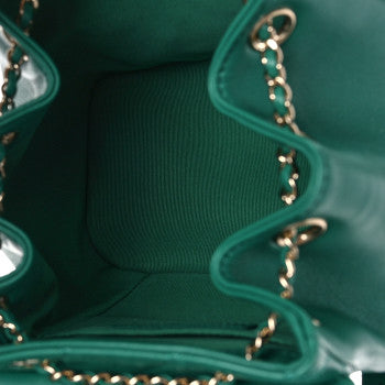 CHANEL LAMBSKIN QUILTED SMALL DUMA DRAWSTRING BACKPACK IN GREEN